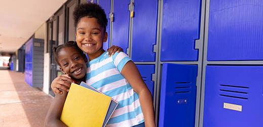 two students next to lockers 