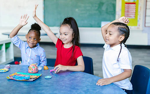 Students Raising Hands