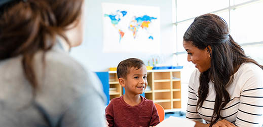 student with two adults